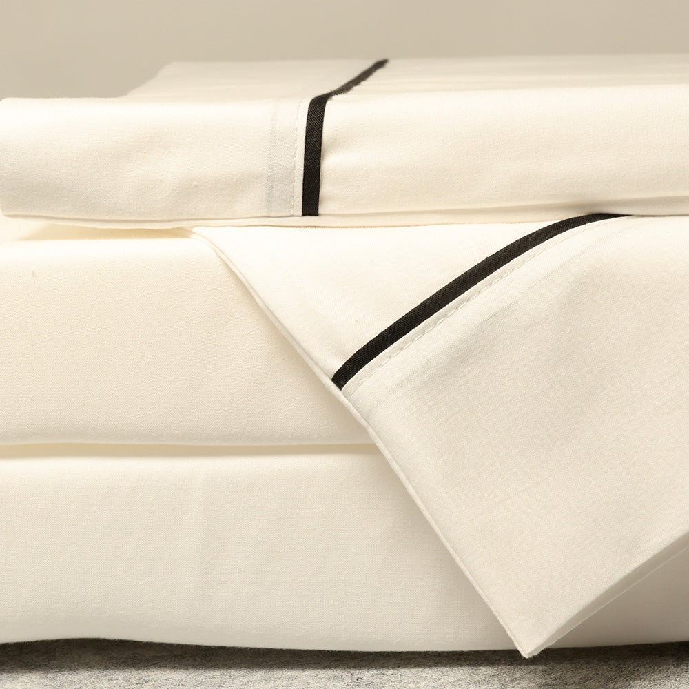natural and black bed sheets